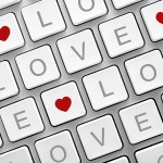 computer keyboard with hearts and LOVE letters