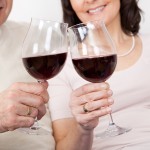 Mature Couple Drinking Red Wine